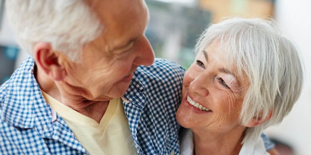 Senior couple looking at each other